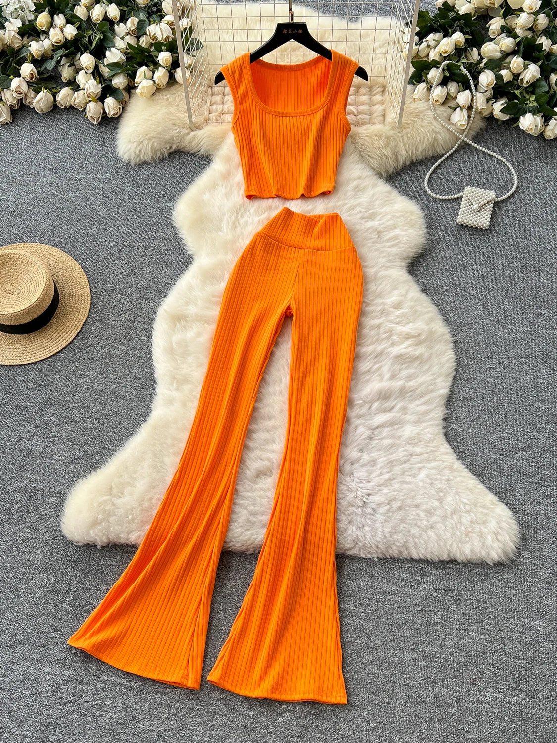 orange dress pants outfit Sleeveless Orange Crop Top Flared Pants Outfit
