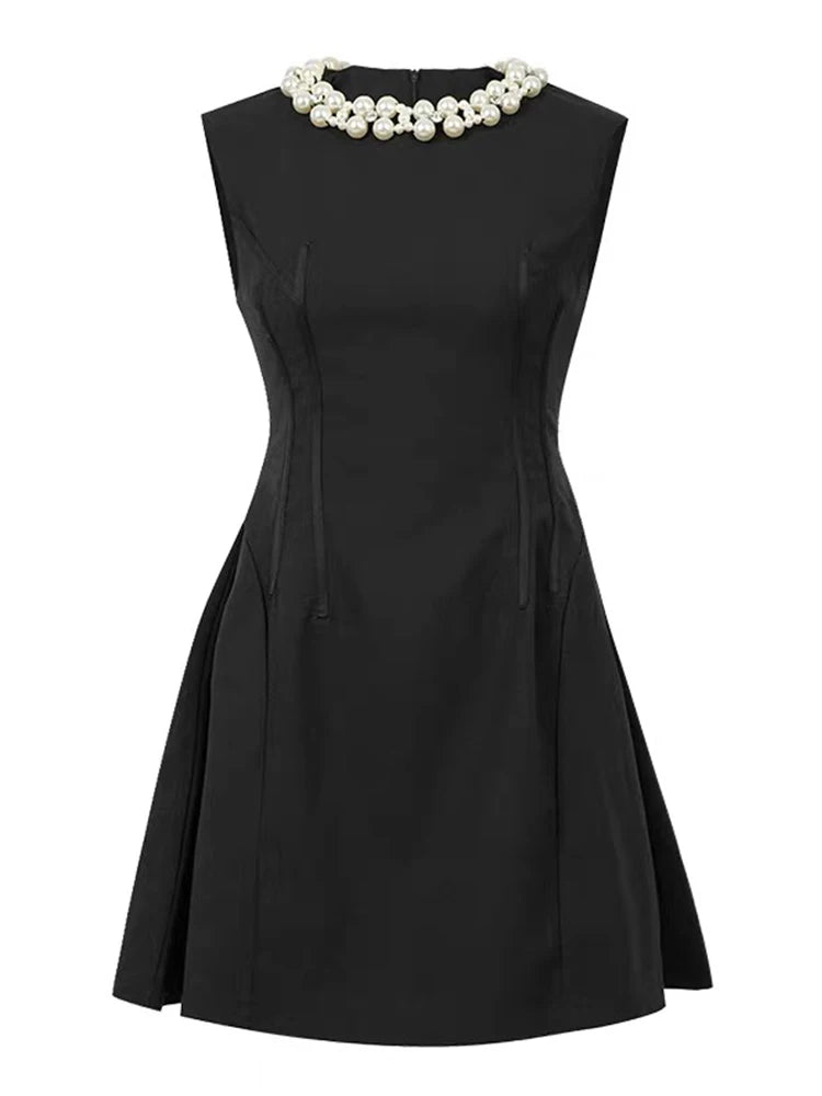 black dress with pearls on neckline Italia Azure Halterneck Pearl Back Maxi making it a standout piece in your wardrobe Black Dress With Pearl Necklace