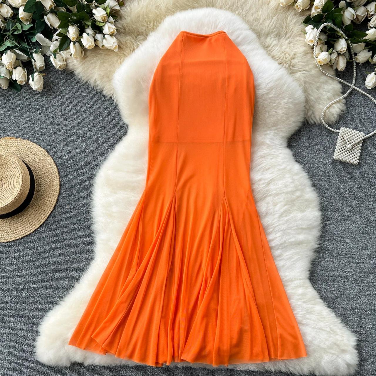 Sleeveless Orange Maxi Dress With Flared Hem