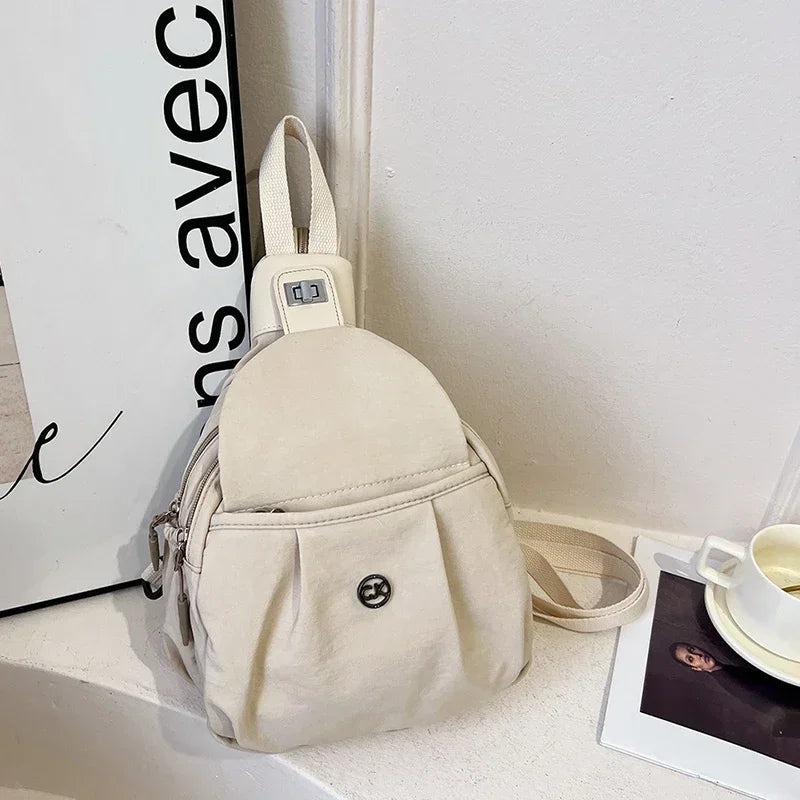 chic mini backpack Petit Monaco Diaper Bag | Stone Grey Light Backpack Effortless shift from work to play Light as a Feather Weighs only 0.80 lb Dimensions Order PetiteGlam Beige Mini Backpack